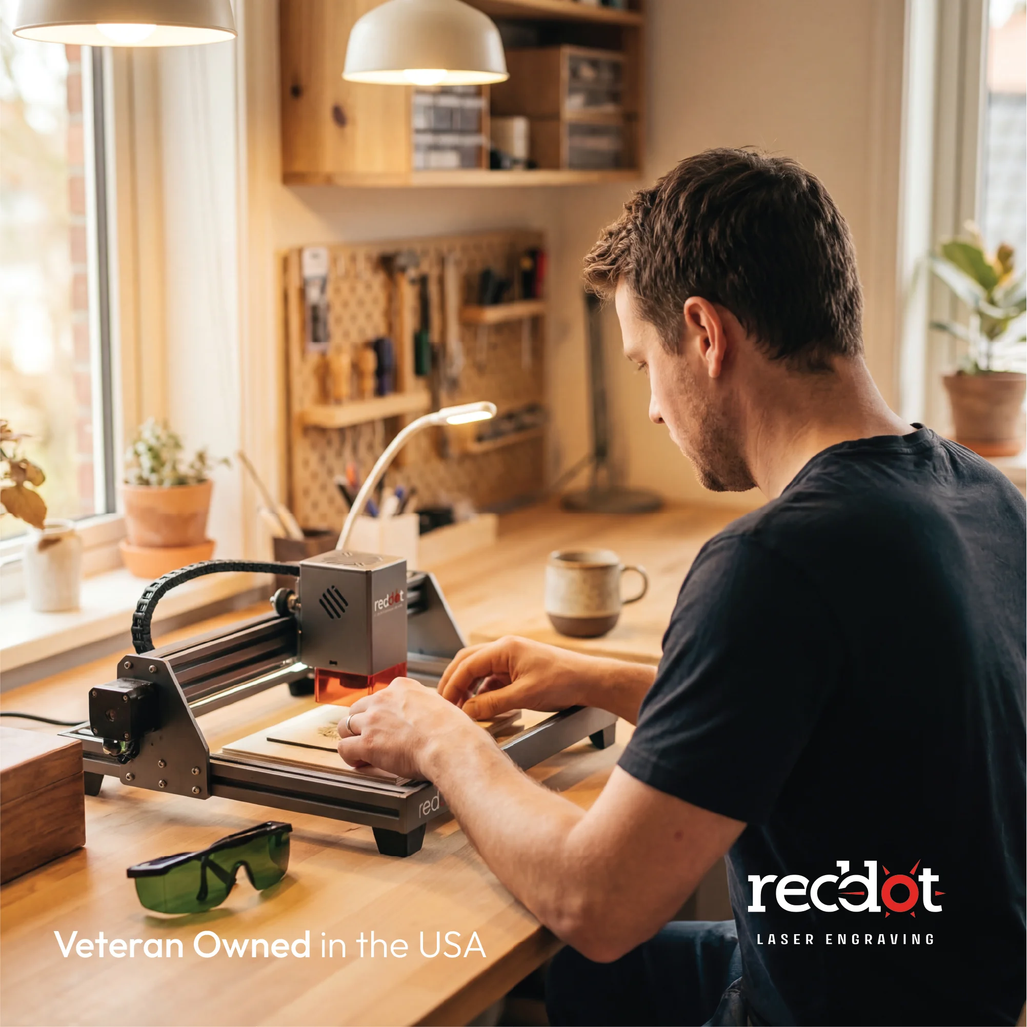 Steve engraving a wallet card in his Virginia workshop